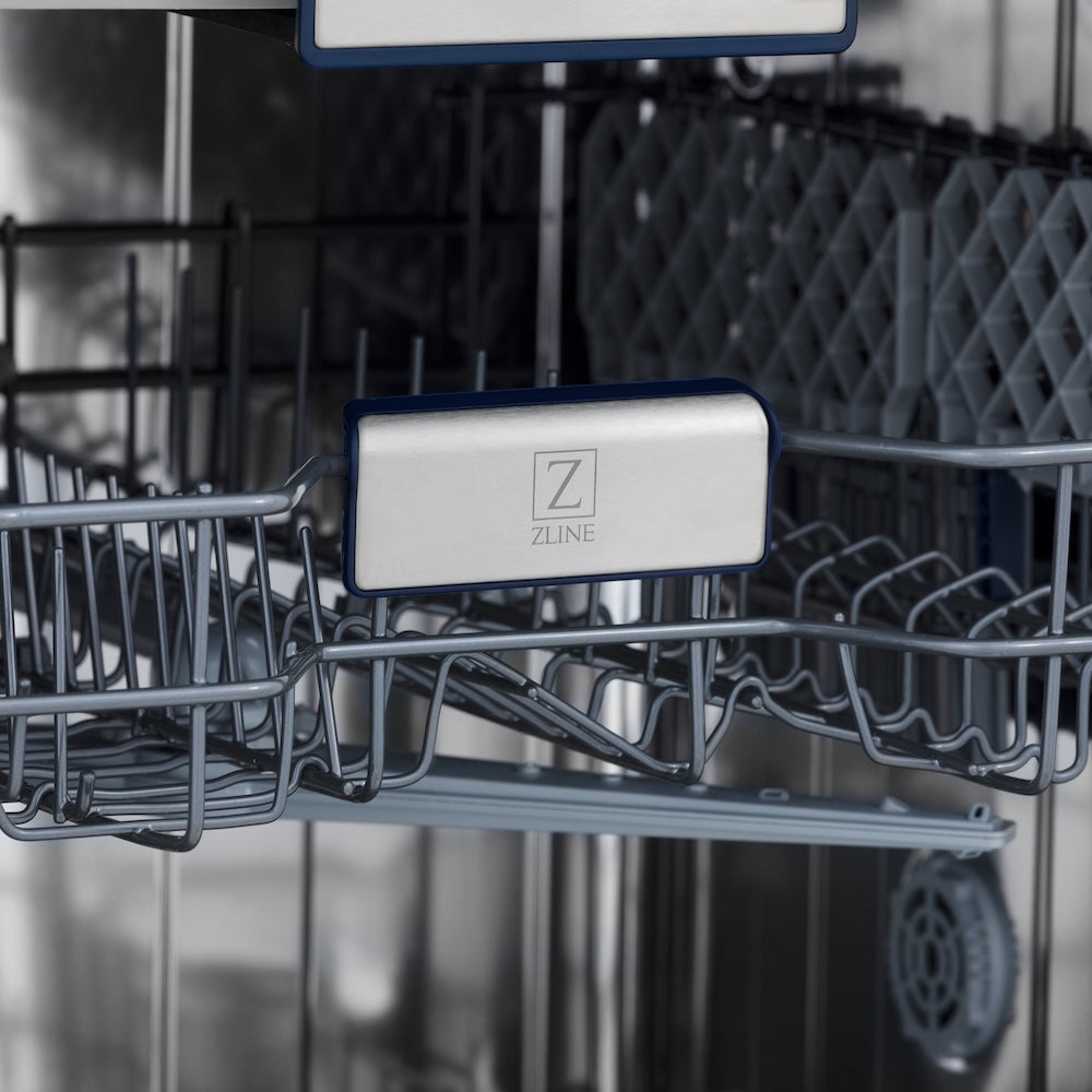 ZLINE 24 in. Tallac Series 3rd Rack Tall Tub Dishwasher in Custom Panel Ready with Stainless Steel Tub, 51dBa (DWV-24) logo on dish rack with dishes in the background.