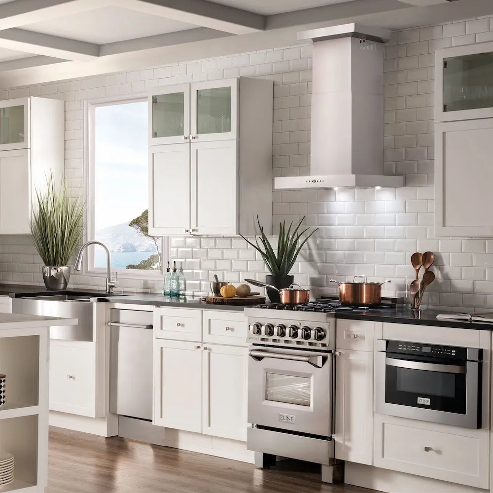 ZLINE 24 in. Convertible Vent Wall Mount Range Hood in Stainless Steel with Crown Molding (KECRN-24) in a luxury kitchen.