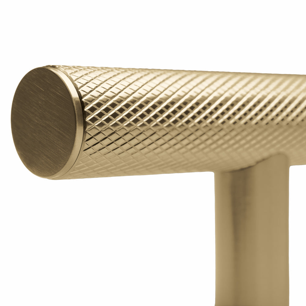 ZLINE Autograph Edition 48 in. Wall-Mount Range Hood Helix Handle (Set of 1) in Champagne Bronze (RHHZ-K-CB-48) close-up detail, showing textured finish with knurling.