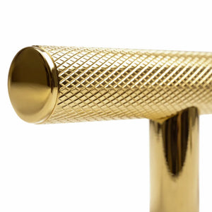 ZLINE Autograph Edition 30 in. Wall-Mount Range Hood Helix Handle (Set of 1) in Polished Gold (RHHZ-K-G-30) close-up detail, showing textured finish with knurling.