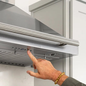 ZLINE Autograph Edition 36 in. Wall-Mount Range Hood Helix Handle (Set of 1) in Polished Nickel (RHHZ-K-PN-36) installed in a designer kitchen.