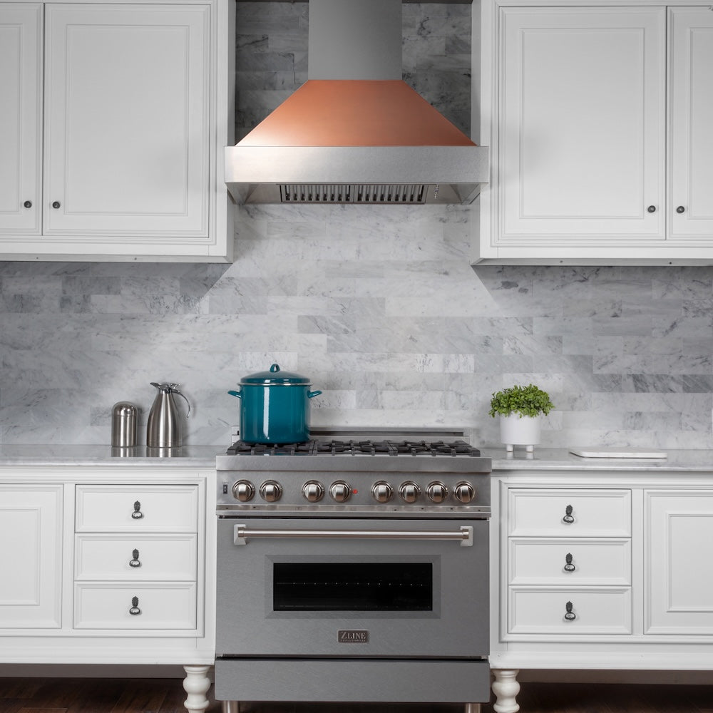 ZLINE 30 in. Ducted Satin Stainless Steel Wall Mount Range Hood with Copper Shell (8654C-30) in a luxury kitchen.