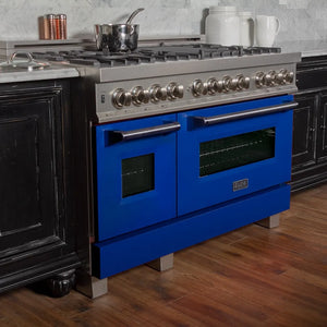 ZLINE 48 in. 6.0 cu. ft. Legacy Dual Fuel Range with 7 Burner Gas Cooktop and 2 Electric Ovens in Satin Stainless Steel and Blue Matte Doors (RAS-BM-48) in a luxury kitchen.