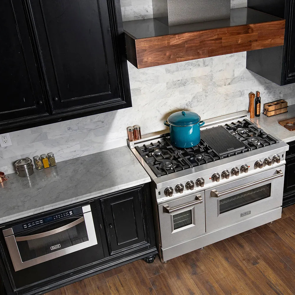 Modern kitchen with ZLINE 48 in. 6.0 cu. ft. Legacy Dual Fuel Range with 7 Burner Gas Cooktop and 2 Electric Ovens in Stainless Steel with Satin Stainless Steel Doors (RA-SN-48) and black cabinets