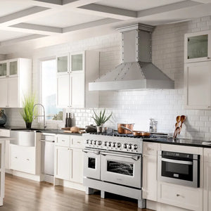 Farmhouse kitchen with white cabinets, ZLINE 48 in. 6.0 cu. ft. Legacy Dual Fuel Range with Gas Cooktop and 2 Electric Ovens in Satin Stainless Steel with 6 Brass Burners (RAS-SN-BR-48), and a large range hood.