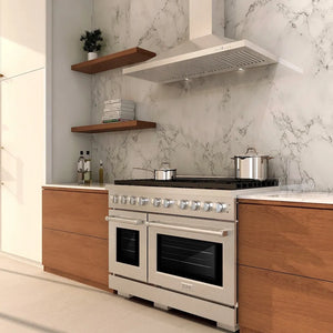 Modern kitchen with a ZLINE 48 in. 6.7 cu. ft. Paramount Double Oven Gas Range with 8 Burner Cooktop in Satin Stainless Steel (SGRS-48) and marble walls.