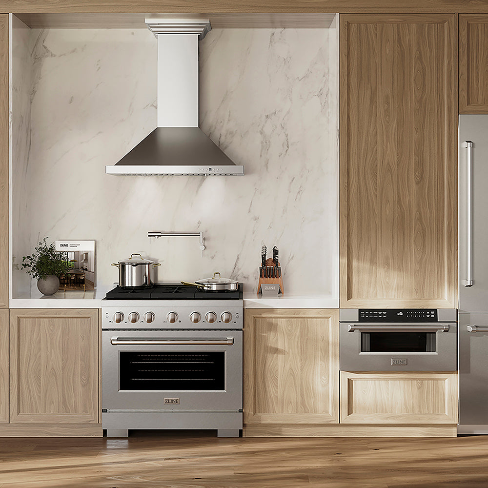 ZLINE 36 in. 5.2 cu. ft. Paramount Gas Range with 6 Burner DuoPro™ Cooktop and Convection Gas Oven in Satin Stainless Steel (PSGRS-36) in a luxury kitchen with wooden cabinets marble backsplash, front.