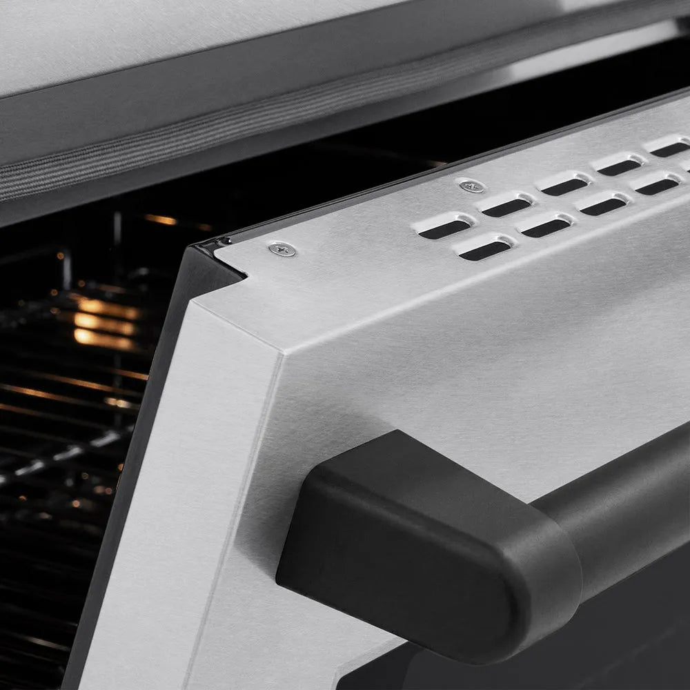 ZLINE Autograph Edition 36 in. 5.2 cu. ft. Paramount Induction Range with 5 Element Cooktop and Electric Convection Oven in Satin Stainless Steel with Matte Black Accents (SINRSZ-36-MB) close-up, oven slightly open, showing oven door handle.