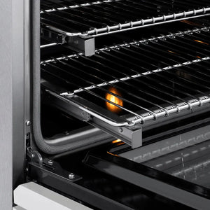 ZLINE Autograph Edition 36 in. 5.2 cu. ft. Paramount Induction Range with 5 Element Cooktop and Electric Convection Oven in Satin Stainless Steel with White Matte Door and Polished Gold Accents (SINRSZ-WM-36-G) close-up, oven open showing SmoothGlide racks and interior components.