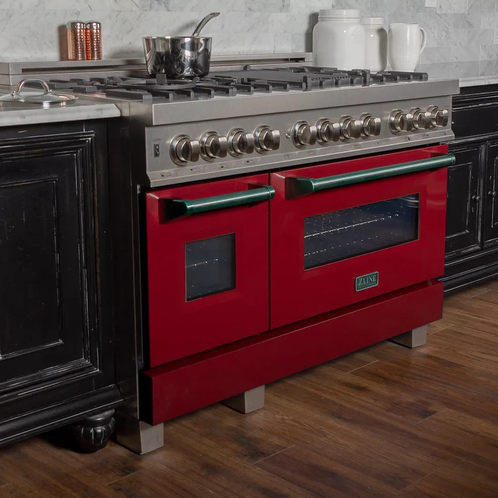 ZLINE 48 in. 6.0 cu. ft. Legacy Dual Fuel Range with 7 Burner Gas Cooktop and 2 Electric Ovens in Satin Stainless Steel and Red Gloss Doors (RAS-RG-48) in a luxury kitchen.