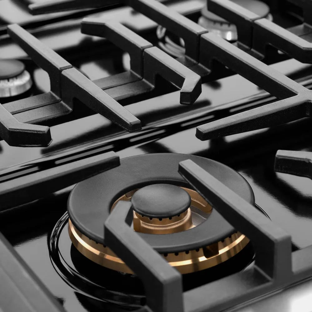 Close-up of ZLINE 36 in. 5.2 cu. ft. Paramount Gas Range with 6 Burner Cooktop and Convection Gas Oven in Satin Stainless Steel with White Matte Door (SGRS-WM-36) burner with black grates