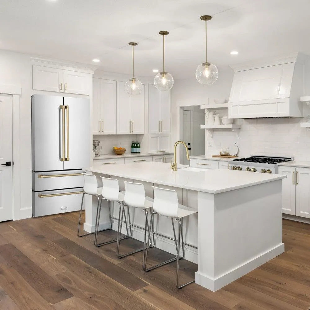 ZLINE Autograph Edition 36 in. 22.5 cu. ft Freestanding French Door Refrigerator with Ice Maker in Fingerprint Resistant Stainless Steel with Champagne Bronze Accents (RFMZ-36-CB) in a cottage-style kitchen with other ZLINE appliances and plumbing fixtures from side.