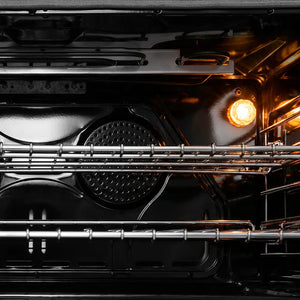 ZLINE 36 in. 4.6 cu. ft. Legacy Dual Fuel Range with 6 Burner Gas Cooktop and Electric Convection Oven in Stainless Steel (RA36) close-up of oven interior with glowing light bulb