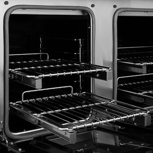 ZLINE Autograph Edition 48 in. 6.7 cu. ft. Paramount Dual Fuel Range with 8 Burner DuoPro™ Cooktop and Dual Ovens with White Matte Doors and Matte Black Accents (PSDRZ-WM-48-MB) close-up, oven open with racks extended, showing design and structure.