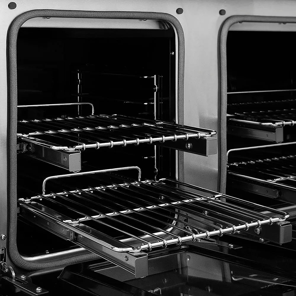 ZLINE Autograph Edition 48 in. 6.7 cu. ft. Paramount Dual Fuel Range with 8 Burner DuoPro™ Cooktop and Dual Ovens in Stainless Steel with Polished Nickel Helix Handles and Accents (PSDRZ-48-KPN) close-up, oven open with racks extended, showing design and structure.