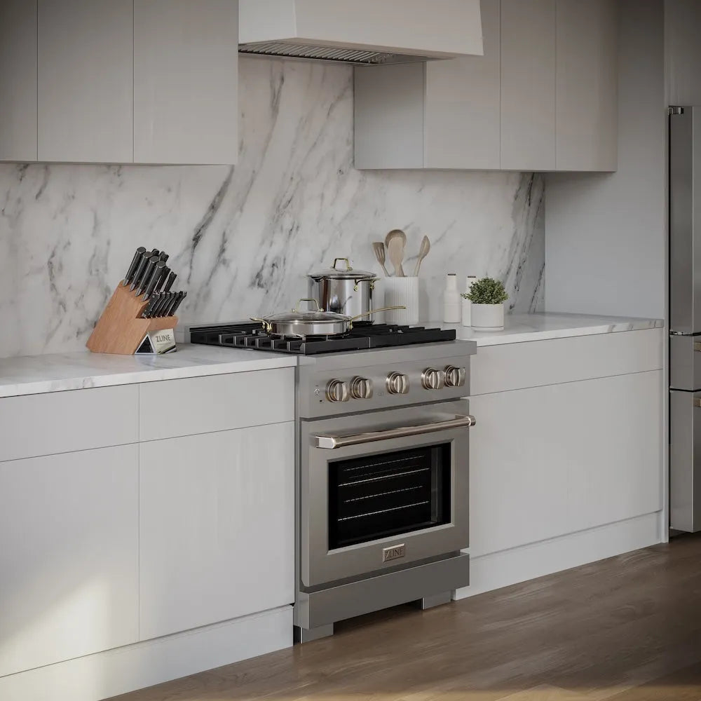 Modern kitchen with ZLINE 30 in. 4.2 cu. ft. Paramount Gas Range with 4 Burner Cooktop and Convection Gas Oven in Stainless Steel (SGR30) and marble backsplash