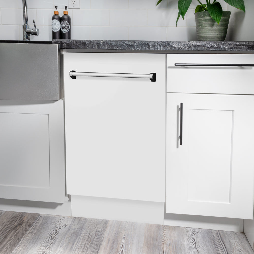 ZLINE 18 in. Tallac Series 3rd Rack Dishwasher with Auto Door Open Drying, 51dBa, White Matte Panel (DWV-WM-18) in a modern kitchen with white cabinets and a gray countertop.
