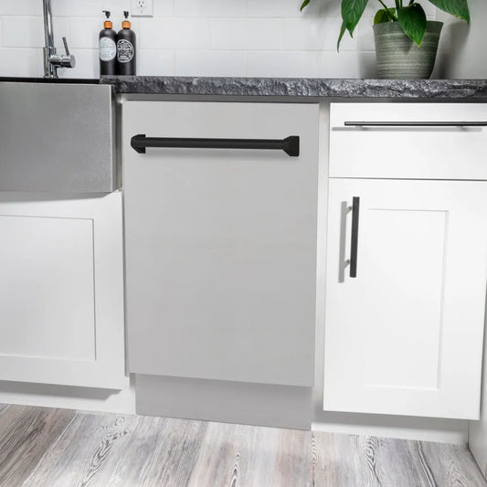 ZLINE Autograph Edition 18 in. Tallac Series 3rd Rack Dishwasher with Auto Door Open Drying, 51dBa, Stainless Steel Panel with Matte Black Handle (DWVZ-304-18-MB) in a modern kitchen with white cabinets and a gray countertop.