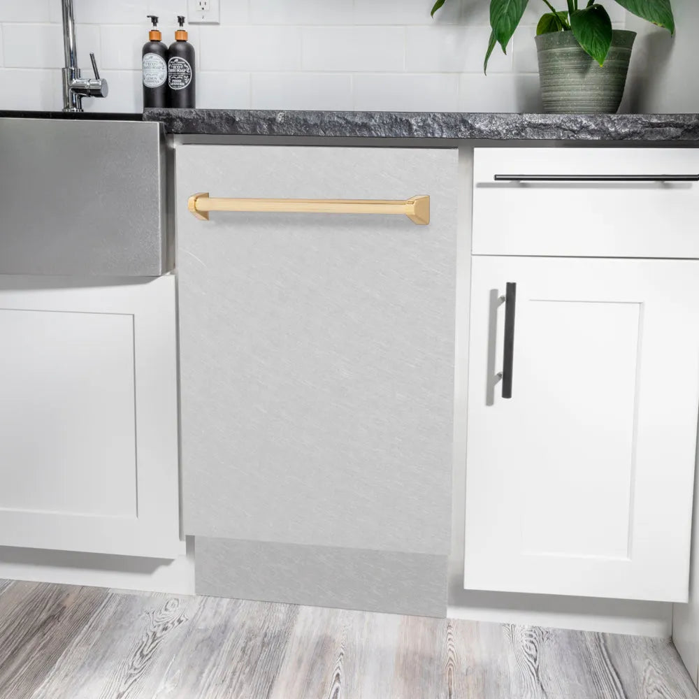 ZLINE Autograph Edition 18 in. Tallac Series 3rd Rack Dishwasher with Auto Door Open Drying, 51dBa, Satin Stainless Steel Panel with Polished Gold Handle (DWVZ-SN-18-G) in a modern kitchen with white cabinets and a gray countertop.
