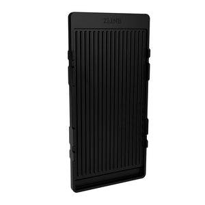 Reversible griddle on a white background, ribbed side.