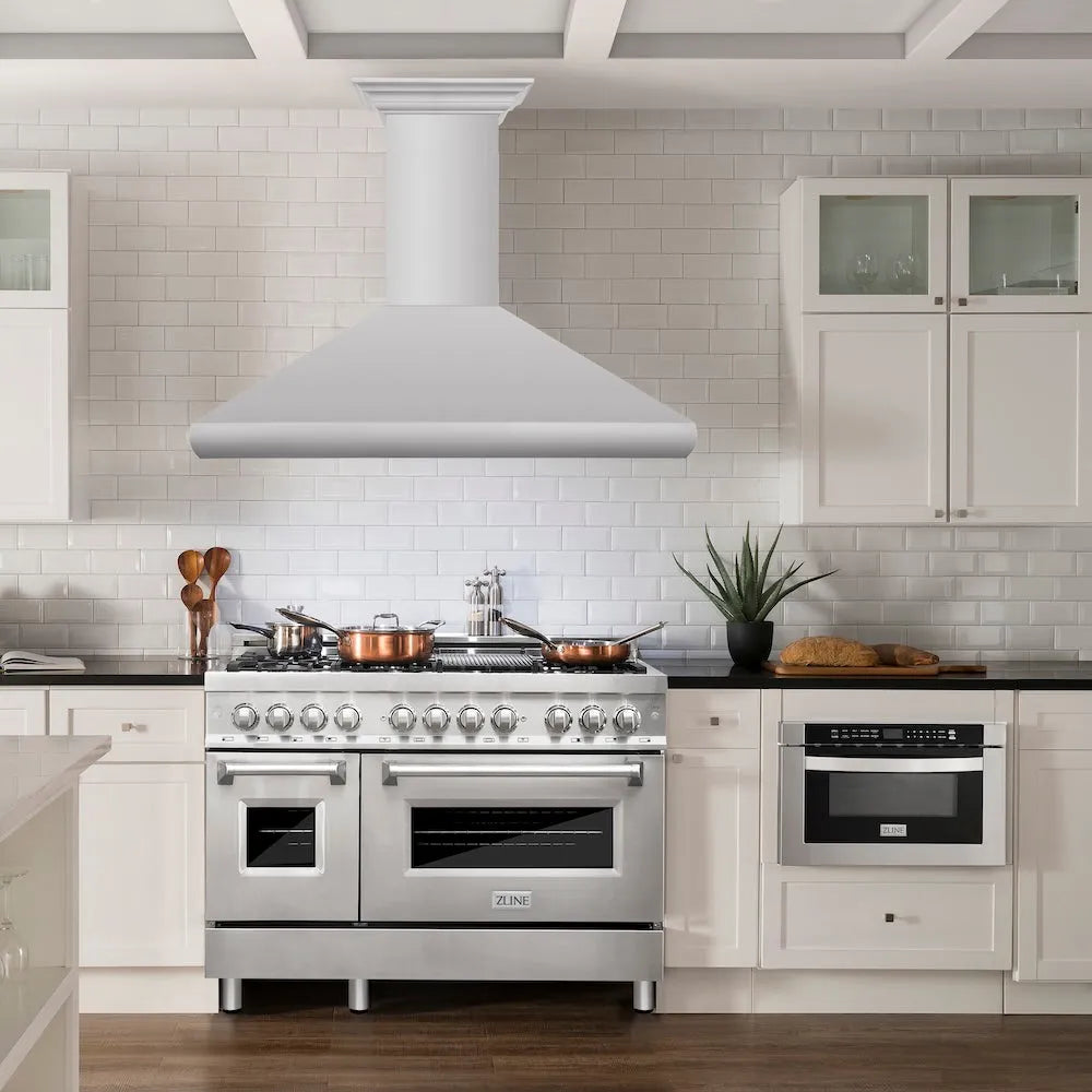 ZLINE 48 in. Professional Convertible Vent Wall Mount Range Hood in Stainless Steel with Crown Molding (587CRN-48) in a luxury kitchen.