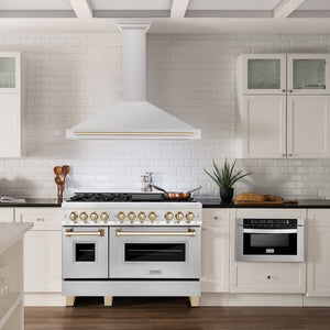 ZLINE Autograph Edition 48 in. Convertible Stainless Steel Range Hood with Stainless Steel Shell and Polished Gold Accents (KB4STZ-48-G) in a luxury kitchen.