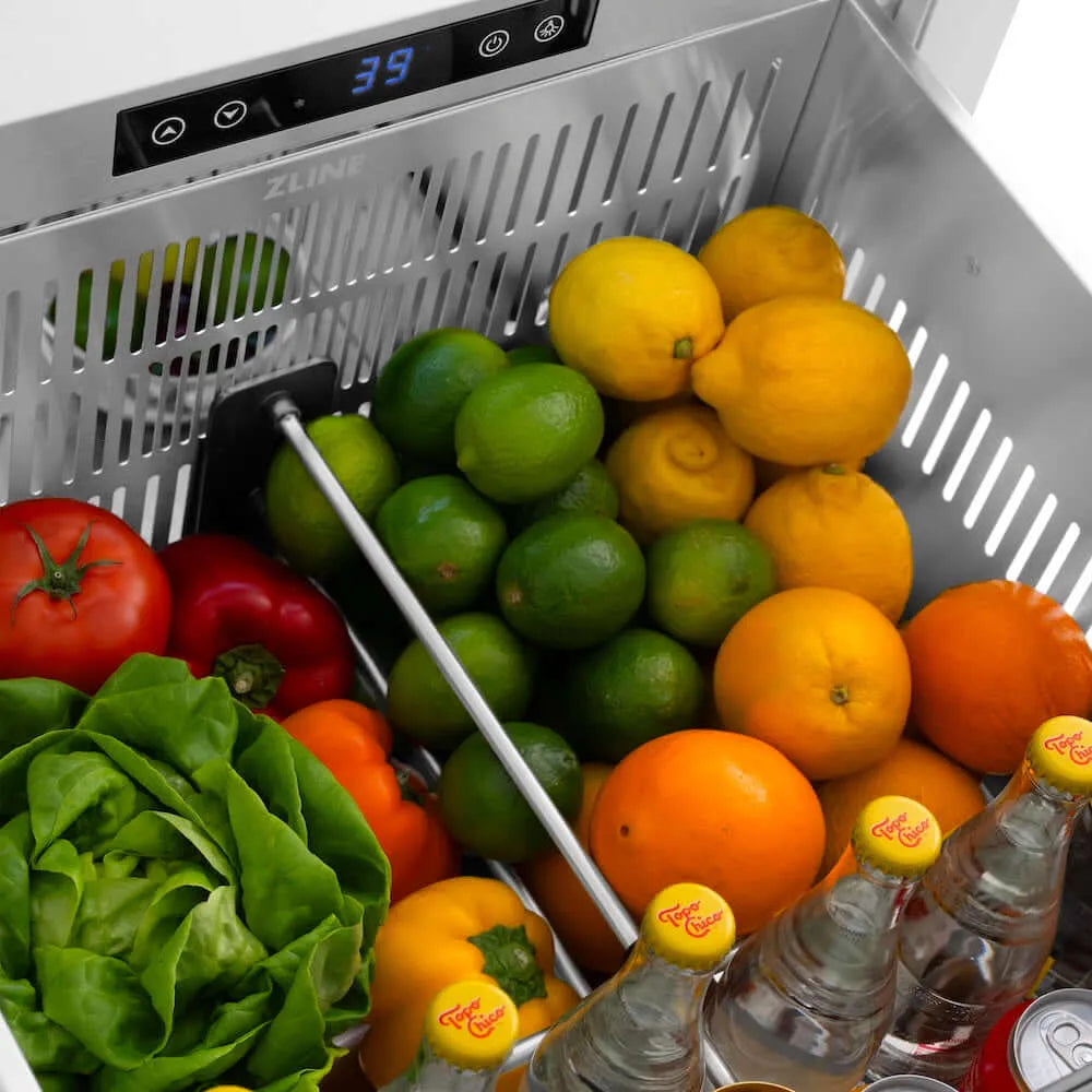 Fresh fruits and vegetables in a ZLINE 24 in. Touchstone 168 Can Outdoor-Rated Dual Refrigerator Drawer with Hand Hammered Copper Doors (RDSO-HH-24) 