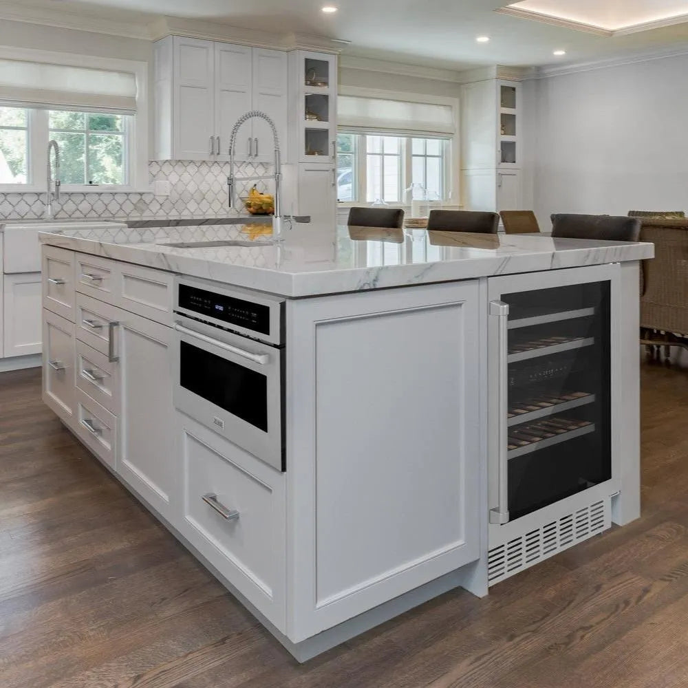 Farmhouse kitchen with a large island featuring a built-in ZLINE 24 in. Monument Dual Zone 44-Bottle Wine Cooler in Stainless Steel (RWV-UD-24).