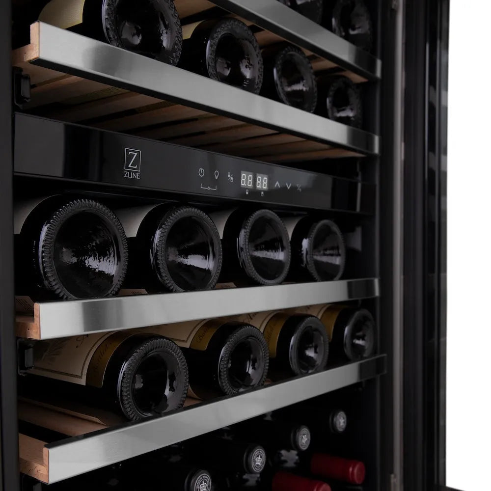 ZLINE Autograph Edition 24 in. Monument Dual Zone 44 Bottle Wine Cooler in Stainless Steel with Champagne Bronze Accents (RWVZ-UD-24-CB) with bottles of wine on wooden shelves