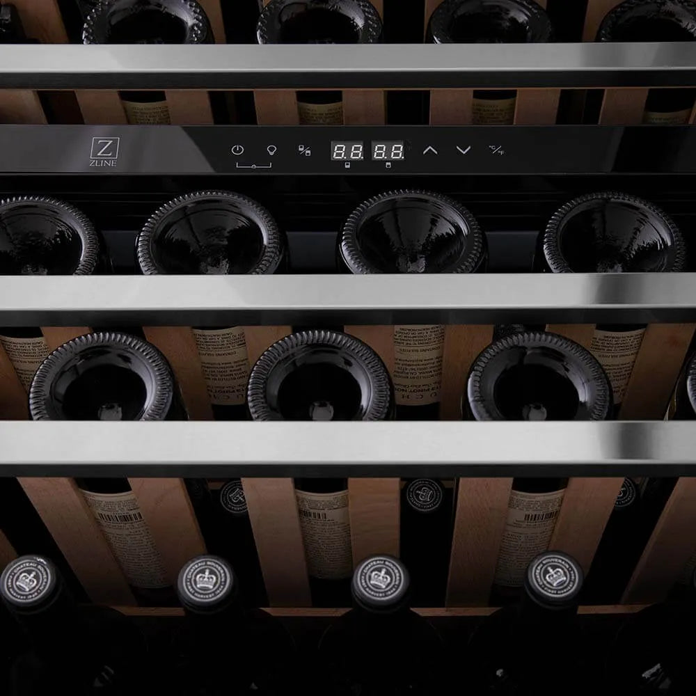 ZLINE Autograph Edition 24 in. Monument Dual Zone 44-Bottle Wine Cooler in Stainless Steel with Matte Black Accents (RWVZ-UD-24-MB) close-up, wine bottles one wooden shelves from below.