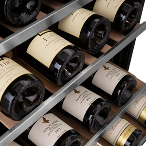 ZLINE Autograph Edition 24 in. Monument Dual Zone 44-Bottle Wine Cooler in Stainless Steel with Matte Black Accents (RWVZ-UD-24-MB) close-up, four rows of red and white wine on extended wood shelves from side.