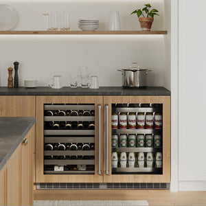 ZLINE 24 in. Touchstone Dual Zone 44 Bottle Wine Cooler With Panel Ready Glass Door (RWDPO-24) in a custom home bar with wood details and matching beverage fridge.