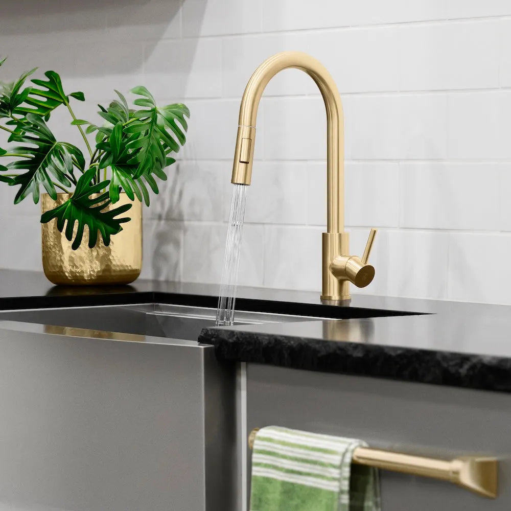 ZLINE Palisades Pull Down Single Handle Kitchen Faucet in Champagne Bronze (RBCN1-KF-CB) in a luxury kitchen, water on.