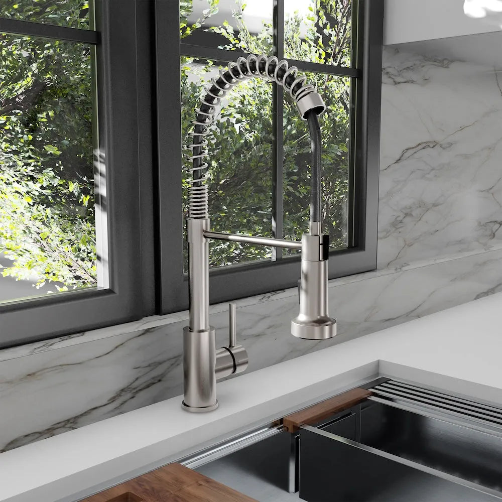 Luxury kitchen faucet with ZLINE Palisades Pull Down Spring Spray Wand Kitchen Faucet in Brushed Nickel (RBCN2-KF-BN) in a marble countertop setting