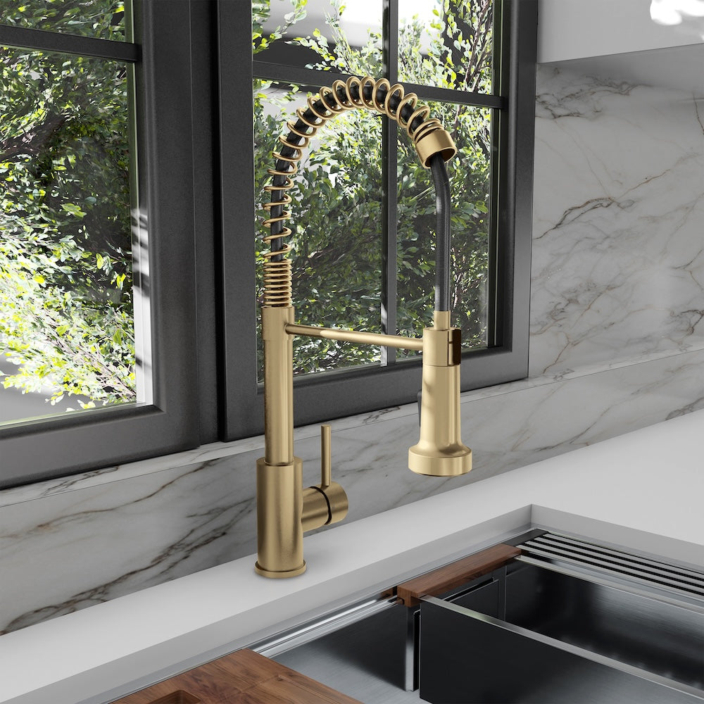 ZLINE Palisades Pull Down Spring Spray Wand Kitchen Faucet in Champagne Bronze (RBCN2-KF-CB) in a luxury kitchen.
