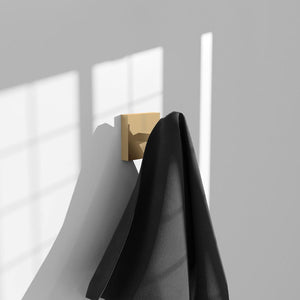 ZLINE Palisades Towel Hook in Champagne Bronze (RBCN1-HK-CB) in a luxury bathroom, with towel.