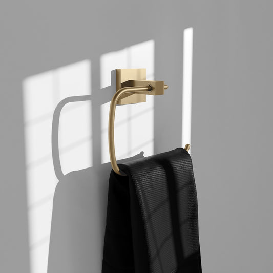 ZLINE Palisades Towel Ring in Champagne Bronze (RBCN1-TRNG-CB) in a luxury bathroom, with towel.