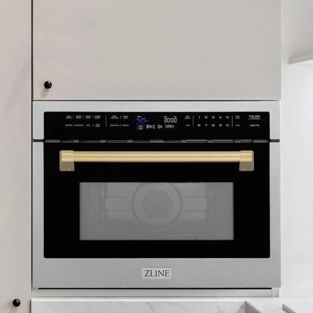 ZLINE Autograph Edition 24 in. 1.6 cu ft. Built-in Convection Microwave Oven in Satin Stainless Steel with Champagne Bronze Accents (MWOZ-24-SS-CB) in a luxury kitchen.
