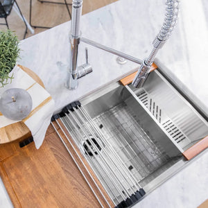ZLINE 33 in. Garmisch Undermount Single Bowl Satin Stainless Steel Kitchen Sink with Bottom Grid and Accessories (SLS-33S) in a luxury kitchen.