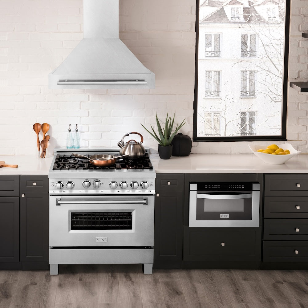 ZLINE 36 in. Satin Stainless Steel Wall Mount Range Hood with Stainless Steel Handle (8654SNX-36) in a luxury kitchen.