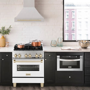 ZLINE Autograph Edition 30 in. Satin Stainless Steel Wall Mount Range Hood with Polished Gold Handle (8654SNZ-30-G) in a luxury kitchen.