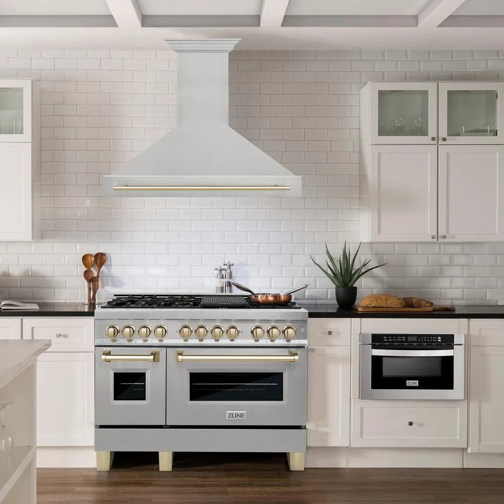 ZLINE Autograph Edition 48 in. Satin Stainless Steel Wall Mount Range Hood with Polished Gold Handle (8654SNZ-48-G) in a luxury kitchen.