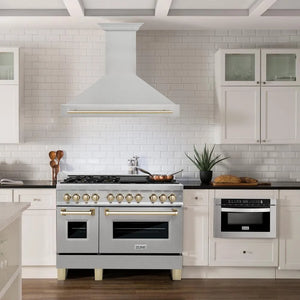 ZLINE Autograph Edition 48 in. Satin Stainless Steel Wall Mount Range Hood with Polished Gold Handle (8654SNZ-48-G) in a luxury kitchen.