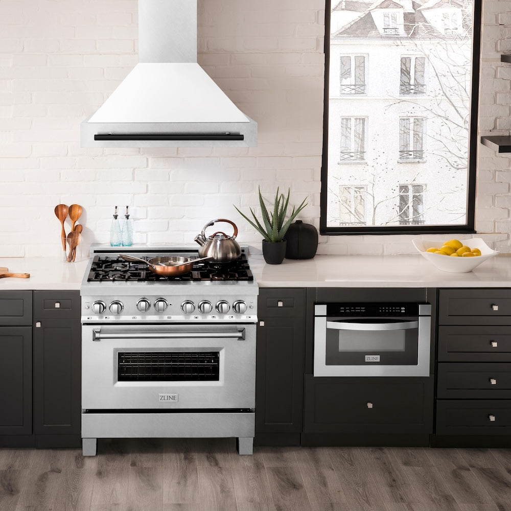 ZLINE Autograph Edition 36 in. Satin Stainless Steel Wall Mount Range Hood with White Matte Shell and Matte Black Handle (8654SNZ-WM36-MB) in a luxury kitchen.