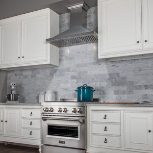 ZLINE 30 in. Designer Series Satin Stainless Steel Convertible Vent Wall Mount Range Hood (8KBS-30) in a luxury kitchen.