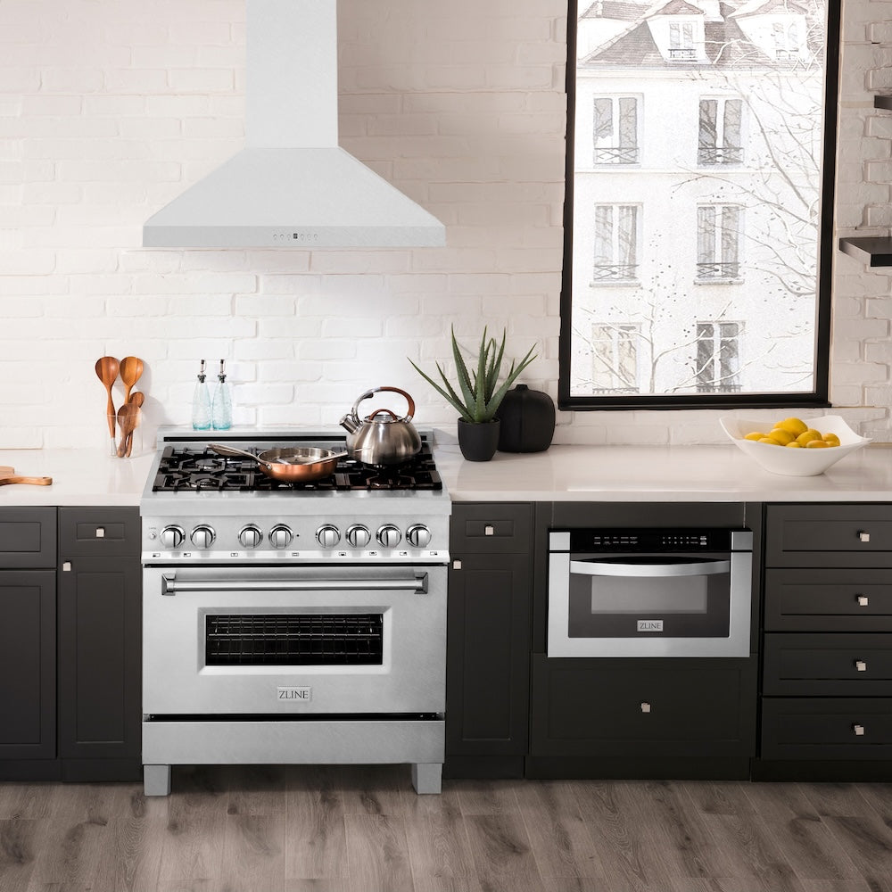 ZLINE 36 in. Convertible Vent Wall Mount Range Hood in Satin Stainless Steel (8KL3S-36) in a luxury kitchen.