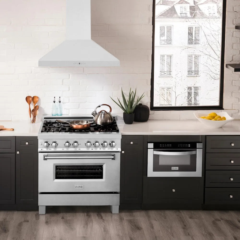 ZLINE 36 in. Convertible Vent Wall Mount Range Hood in Satin Stainless Steel (8KL3S-36) in a luxury kitchen.