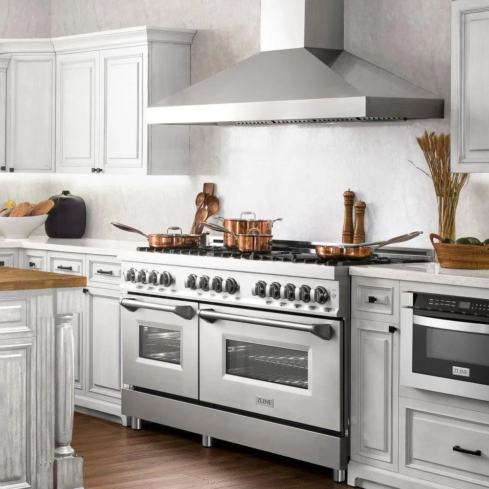 ZLINE 60 in. 7.4 cu. ft. Legacy Dual Fuel Range with Gas Cooktop and 2 Electric Convection Ovens in Stainless Steel with 8 Brass Burners (RA-BR-60) in a luxury kitchen, side.