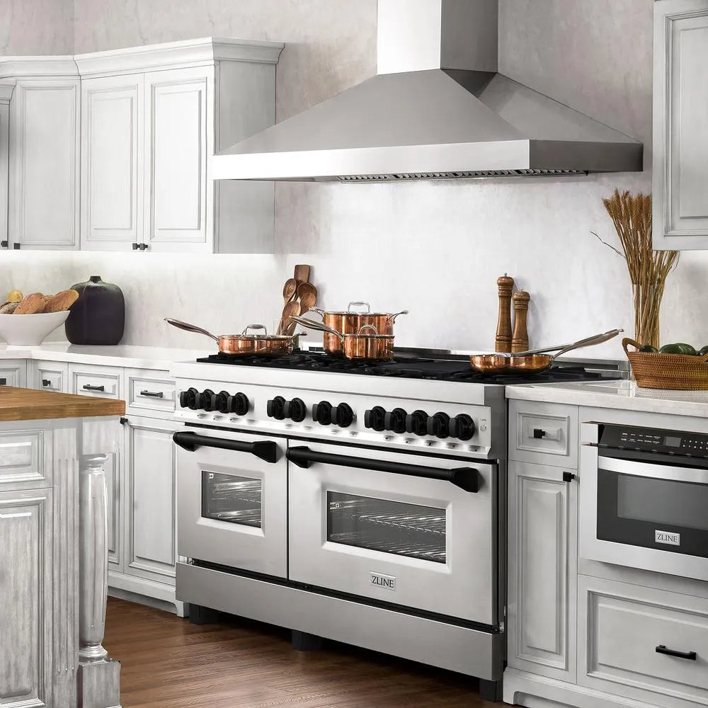 ZLINE Autograph Edition 60 in. 7.4 cu. ft. Legacy Dual Fuel Range with 9 Burner Gas Cooktop and 2 Electric Convection Ovens in Stainless Steel and Matte Black Accents (RAZ-60-MB) in a luxury kitchen, side.