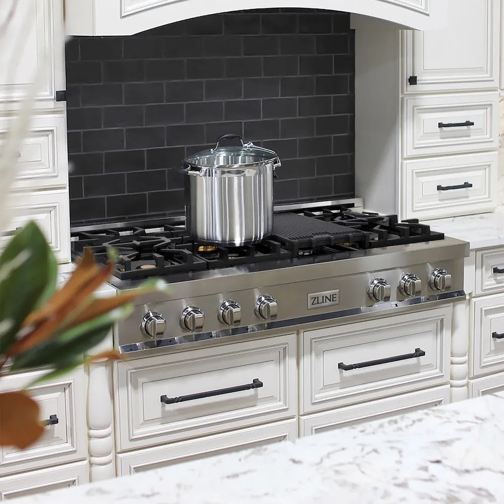 ZLINE 48 in. Legacy Gas Rangetop with 6 Brass Burners and Porcelain Cooktop in Stainless Steel (RT-BR-48) in a kitchen with black tiled backsplash and white cabinets.